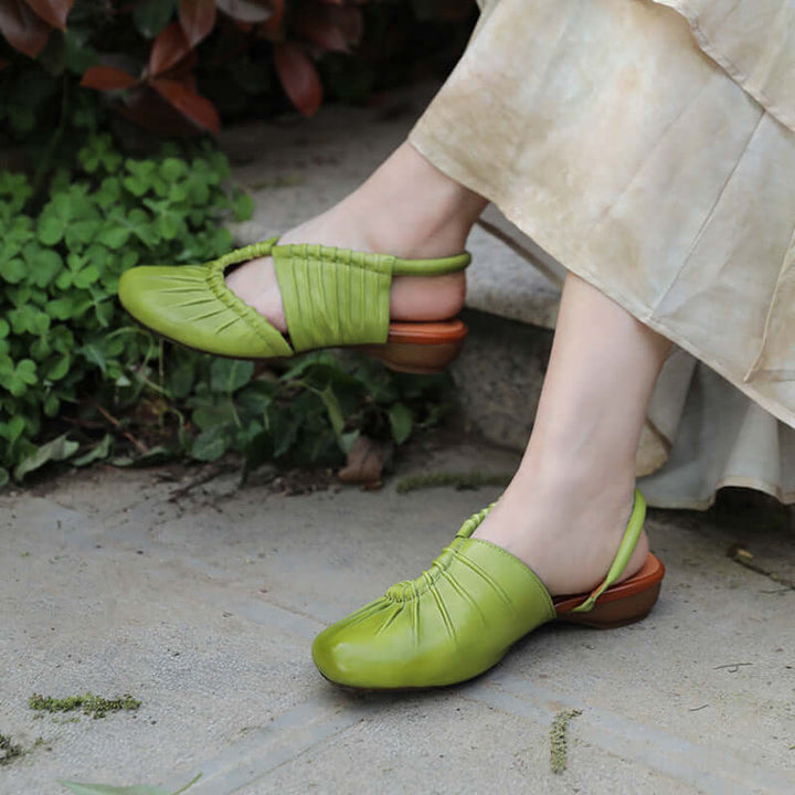 Green Leather Low Heel Women's Sandals with Vintage-Inspired Design
 
 Step out in style with our Green Leather Low Heel Women's Sandals. Crafted with first layer cowhide upper material and a durable rubber sole, these sandals offerFLAT SHOESThebesttailorThebesttailorCowhide wrinkled round toe leather shoes low heel retro casual womens green leather sandalsThebesttailorCowhide wrinkled round toe leather shoes low heel retro casual womens green leather sandals