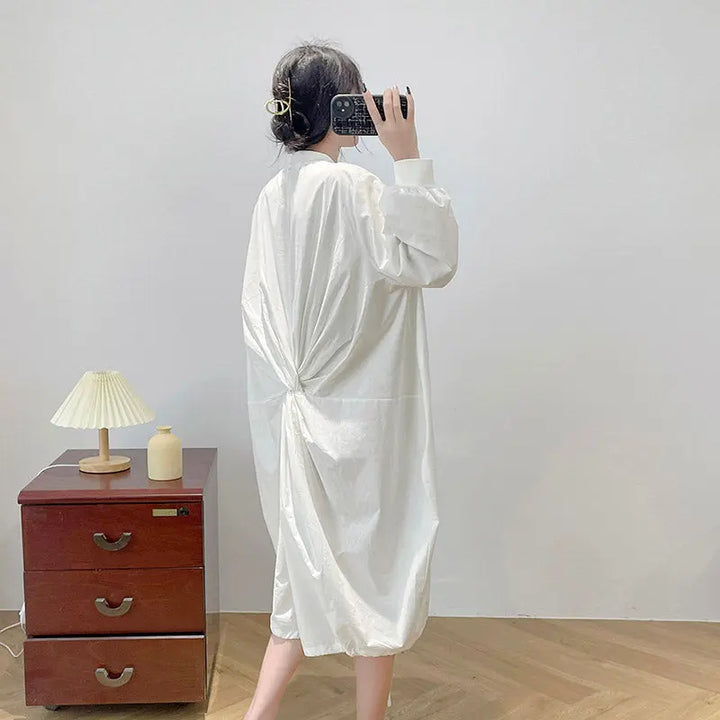 White Oversized Long-Sleeved Shirt Dress for Women
 
 
 Step up your style game with this chic and versatile white shirt dress. Designed with an oversized fit and long sleeves, this dress offers a laid-back yet fashWomen's dressThebesttailorThebesttailorWomen'ThebesttailorWomen'
