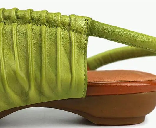 Green Leather Low Heel Women's Sandals with Vintage-Inspired Design
 
 Step out in style with our Green Leather Low Heel Women's Sandals. Crafted with first layer cowhide upper material and a durable rubber sole, these sandals offerFLAT SHOESThebesttailorThebesttailorCowhide wrinkled round toe leather shoes low heel retro casual womens green leather sandalsThebesttailorCowhide wrinkled round toe leather shoes low heel retro casual womens green leather sandals