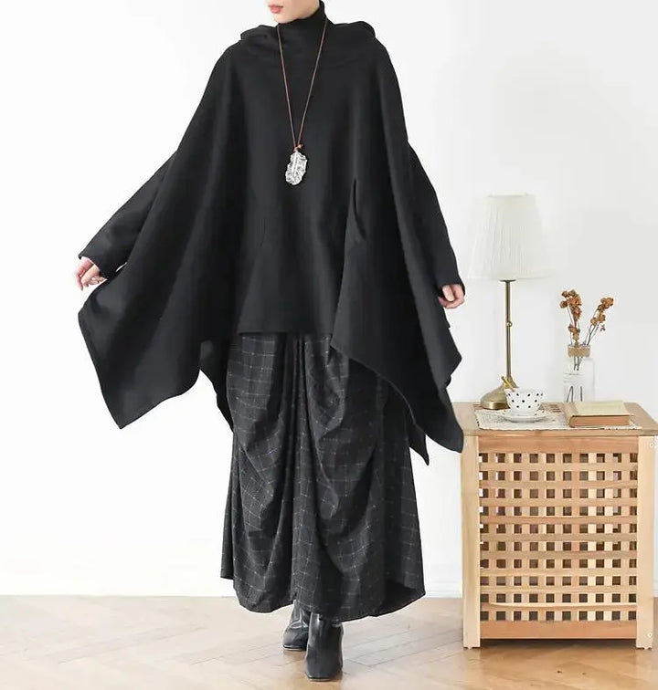 Women's Cotton Hooded Asymmetric Long Cape Coat
Stay Warm and Stylish This Winter
Elevate your winter wardrobe with our Women's Cotton Hooded Asymmetric Long Cape Coat. Made from soft cotton, this oversized cape Women's coatThebesttailorThebesttailorSpring Asymmetric Grey Cotton Hooded Capes Cape CoatsThebesttailorSpring Asymmetric Grey Cotton Hooded Capes Cape Coats