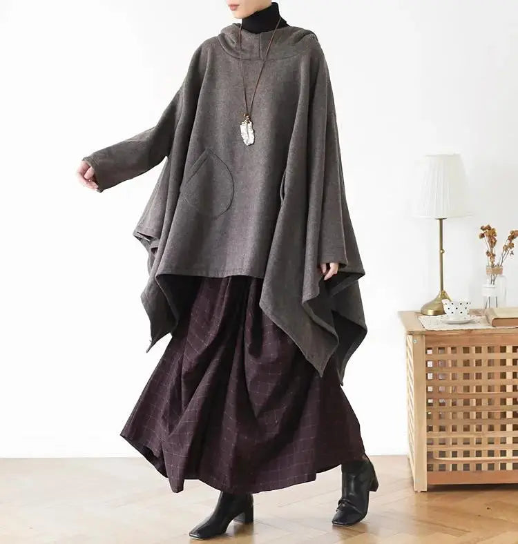 Women's Cotton Hooded Asymmetric Long Cape Coat
Stay Warm and Stylish This Winter
Elevate your winter wardrobe with our Women's Cotton Hooded Asymmetric Long Cape Coat. Made from soft cotton, this oversized cape Women's coatThebesttailorThebesttailorSpring Asymmetric Grey Cotton Hooded Capes Cape CoatsThebesttailorSpring Asymmetric Grey Cotton Hooded Capes Cape Coats