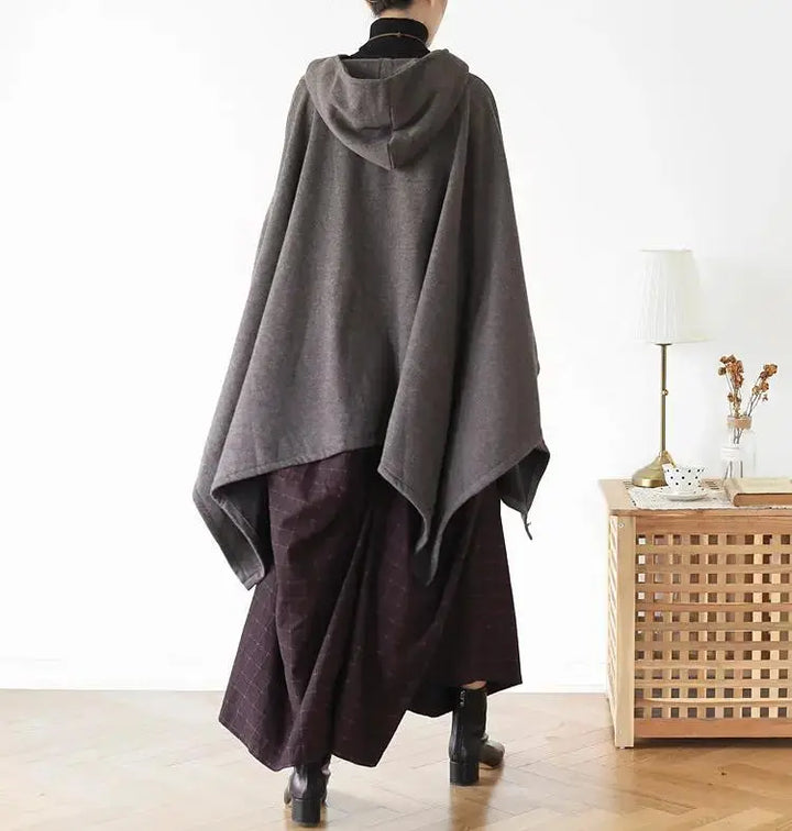 Women's Cotton Hooded Asymmetric Long Cape Coat
Stay Warm and Stylish This Winter
Elevate your winter wardrobe with our Women's Cotton Hooded Asymmetric Long Cape Coat. Made from soft cotton, this oversized cape Women's coatThebesttailorThebesttailorSpring Asymmetric Grey Cotton Hooded Capes Cape CoatsThebesttailorSpring Asymmetric Grey Cotton Hooded Capes Cape Coats