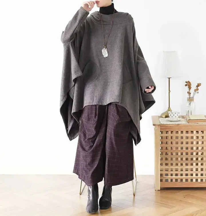 Women's Cotton Hooded Asymmetric Long Cape Coat
Stay Warm and Stylish This Winter
Elevate your winter wardrobe with our Women's Cotton Hooded Asymmetric Long Cape Coat. Made from soft cotton, this oversized cape Women's coatThebesttailorThebesttailorSpring Asymmetric Grey Cotton Hooded Capes Cape CoatsThebesttailorSpring Asymmetric Grey Cotton Hooded Capes Cape Coats