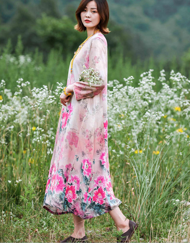 Stylish women's summer cotton dress featuring pink peony flowers and bracelet sleeves, perfect for holidays.