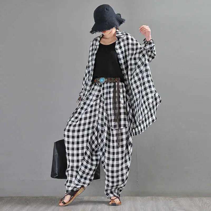 Bohemian Black and White Checkered Linen Harem Trousers for Ladies Thi
 
 Upgrade your summer wardrobe with our Bohemian Black and White Checkered Linen Harem Trousers for Ladies. These Women's Linen Bloomers Pants are the perfect blenWomen's pantsThebesttailorThebesttailorWhite Plaid Bohemian Long Harem PantsThebesttailorWhite Plaid Bohemian Long Harem Pants