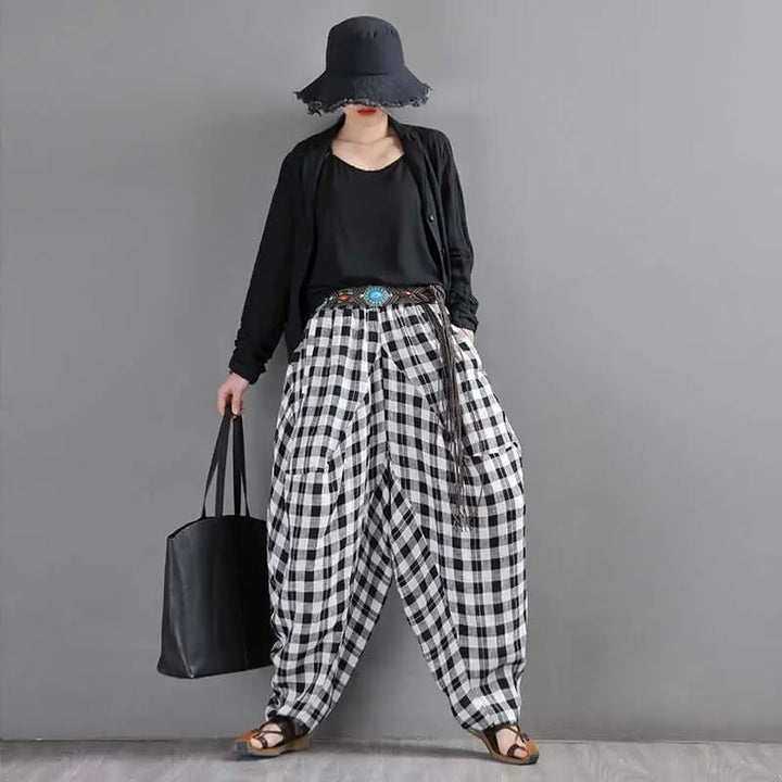Bohemian Black and White Checkered Linen Harem Trousers for Ladies Thi
 
 Upgrade your summer wardrobe with our Bohemian Black and White Checkered Linen Harem Trousers for Ladies. These Women's Linen Bloomers Pants are the perfect blenWomen's pantsThebesttailorThebesttailorWhite Plaid Bohemian Long Harem PantsThebesttailorWhite Plaid Bohemian Long Harem Pants