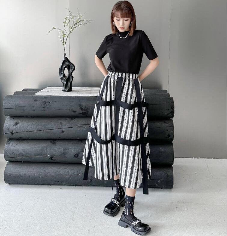 Stylish High Waisted Black and White Striped Harajuku Y2K Skirt
 
 This women's high waisted black and white striped Harajuku Y2K skirt is the perfect addition to your everyday wardrobe. Not only does it pull together any outfitWomen's SkirtsThebesttailorThebesttailorwhite stripe harajuku y2k skirtThebesttailorwhite stripe harajuku y2k skirt